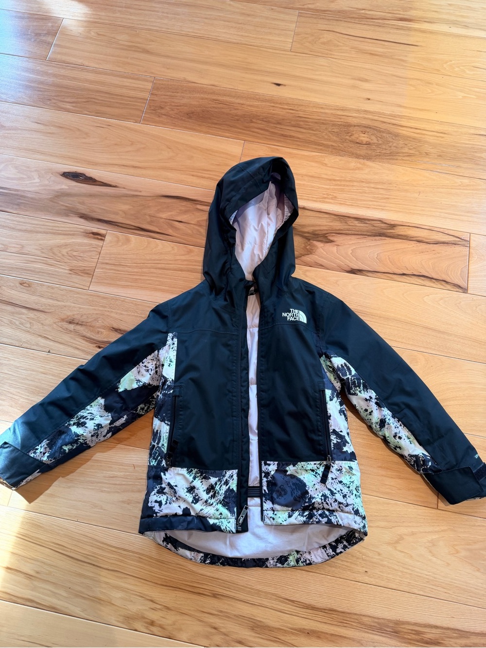 The North Face Girls Black Hooded Ski Jacket with Multicolor Pattern